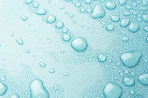 Splash Water drops on Light  Background Stock Photos