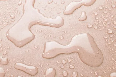 Splash Water drops on Light  Background Stock Photos