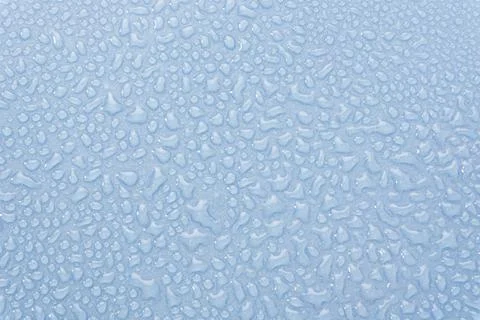 Splash Water drops on Light  Background Stock Photos