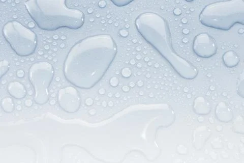Splash Water drops on Light  Background Stock Photos