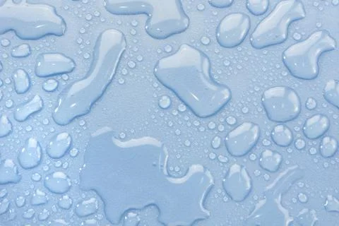 Splash Water drops on Light  Background Stock Photos