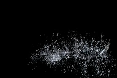 Splash of water. Isolate on black background Stock Photos