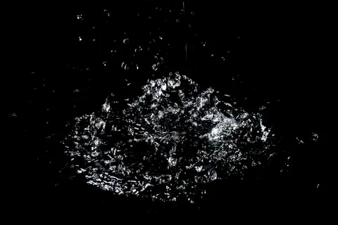 Splash of water. Isolate on black background Stock Photos