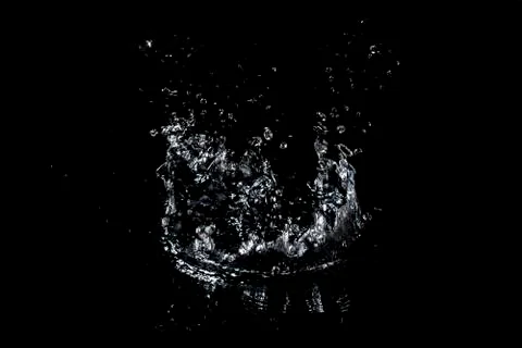 Splash of water. Isolate on black background Stock Photos
