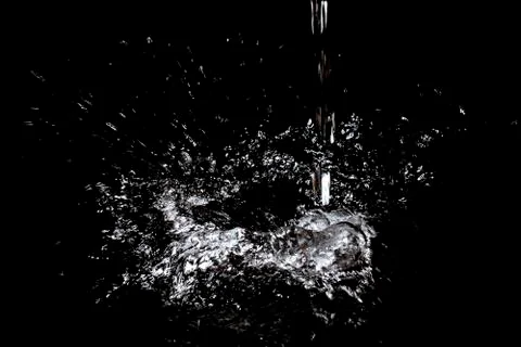 Splash of water. Isolate on black background Stock Photos