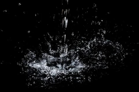 Splash of water. Isolate on black background Stock Photos