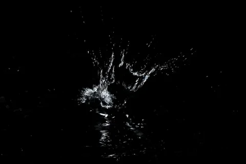 Splash of water. Isolate on black background Stock Photos