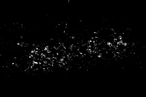 Splash of water. Isolate on black background 写真素材
