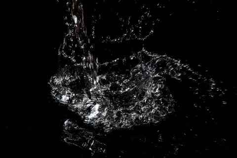 Splash of water. Isolate on black background Stock Photos