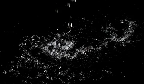 Splash of water. Isolate on black background Stock Photos