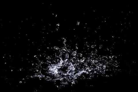 Splash of water. Isolate on black background 写真素材