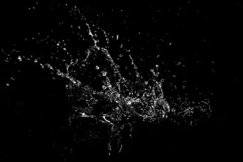 Splash of water. Isolate on black background Stock Photos