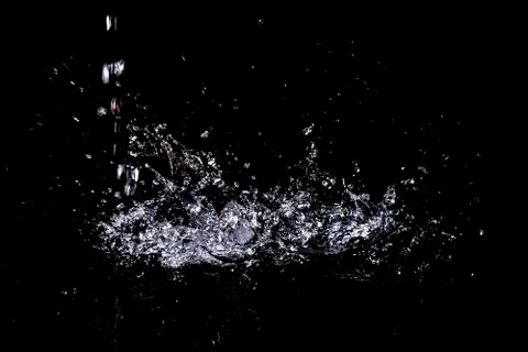 Splash of water. Isolate on black background Foto stock
