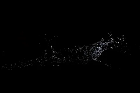Splash of water. Isolate on black background Stock Photos