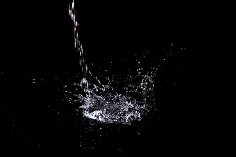 Splash of water. Isolate on black background Stock Photos