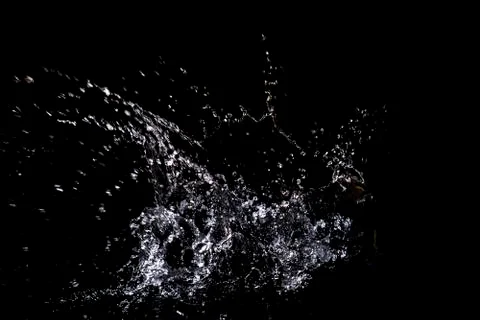 Splash of water. Isolate on black background Stock Photos