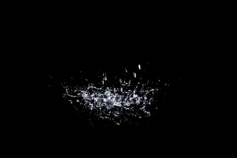 Splash of water. Isolate on black background Stock Photos