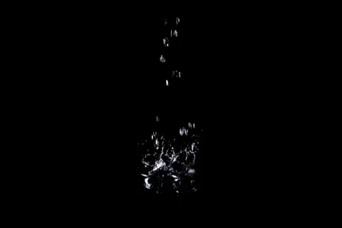 Splash of water. Isolate on black background Stock Photos