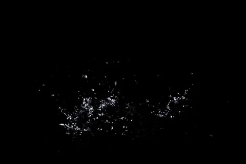 Splash of water. Isolate on black background Stock Photos