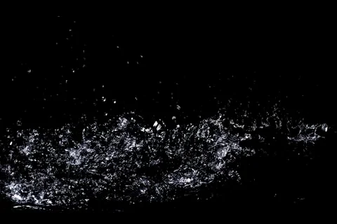 Splash of water. Isolate on black background Stock Photos