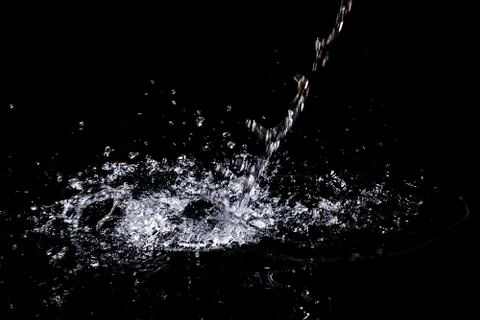 Splash of water. Isolate on black background Stock Photos