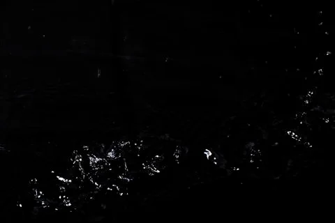 Splash of water. Isolate on black background Stock Photos