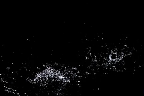 Splash of water. Isolate on black background Stock Photos