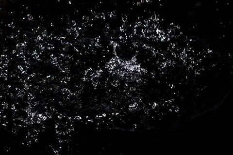 Splash of water. Isolate on black background Stock Photos