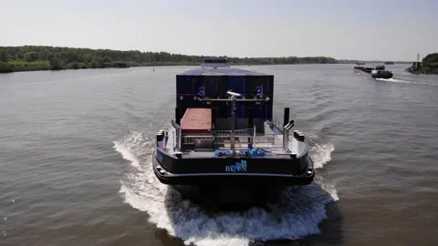 Splash Waters From Merchant Ship Bow Navigating On Calm River At Sunny Video stock 157746374