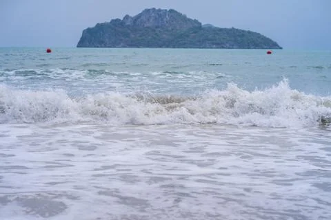 Splash wave on the surface on the beach Stock Photos