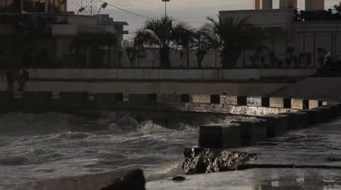 Splash of waves on the pier against the sun. Stock Footage 51929668