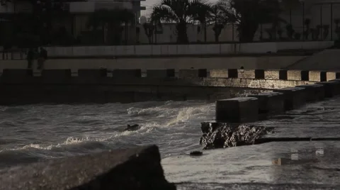 Splash of waves on the pier against the sun. Stock Footage 51929697