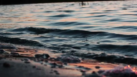 The splash of the waves in the setting sun. Stock Footage 233578217
