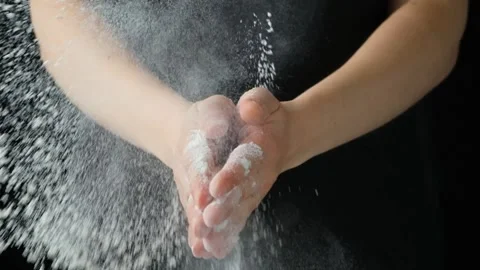 Splash of wheat flour, cook working with dough, hands close-up, slow motion Video stock 288192954