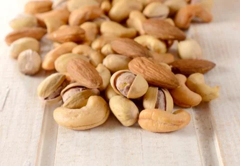 Splashed nuts mix Stock Photos