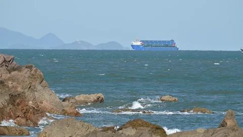 Splashed waves and container ship in the ocean Stock Footage 285468256
