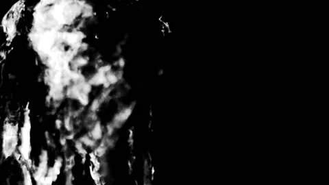 Splashes in the air on a black background Stock Footage 203612873