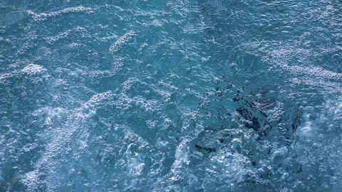 Splashes and Bubble Water in Swimming Pool with Jacuzzi Stock Footage 103577622