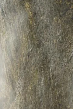 Splashes and water mist of the Chegem waterfall Stock Photos