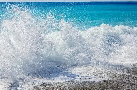 Splashes of azure waves in Nice Stock Photos
