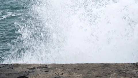 Splashes big strong waves crashing on the pier. Front view Stock Footage 99828841