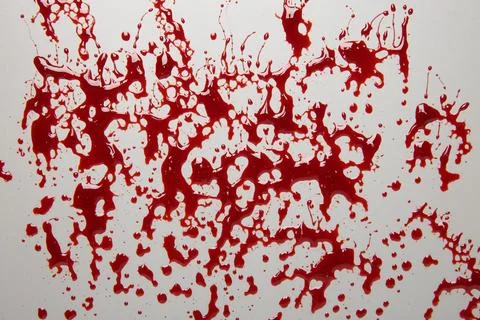 Splashes of blood on light grey background, top view 库存照片
