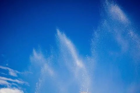 Splashes in the blue sky. Stock Photos