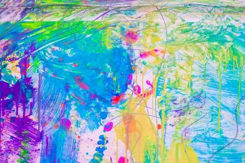 Splashes of bright paints on a white background. Stock Photos
