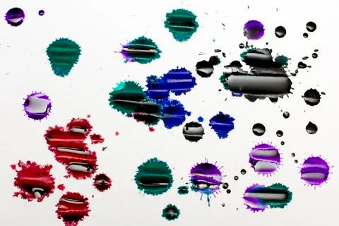 Splashes of colored ink Stock Photos