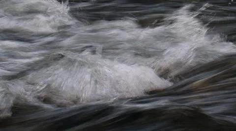 Splashes in a fast stream of a water. Stock Footage 8948335