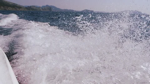 Splashes fly out from under the sea speedboat. Stock Footage 166469012
