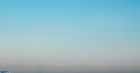 Splashes large strong waves on pier against of bright blue sky spring sunny day Stock Footage 126322284