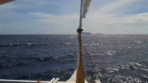 Splashes on sea surface while sailing to island in ocean Stock Footage 112067227
