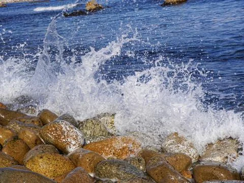 Splashes from sea waves Stock Photos